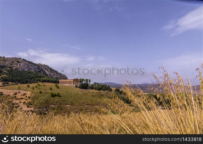 View of the greek temple of segesta and its surroundings in italy sicily