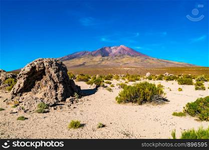 View of the High altitude volcano Tunupa at the edge of the Uyuni Salt Flat in Boliviat