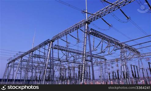 View of the high voltage transmission lines in a heat power plant