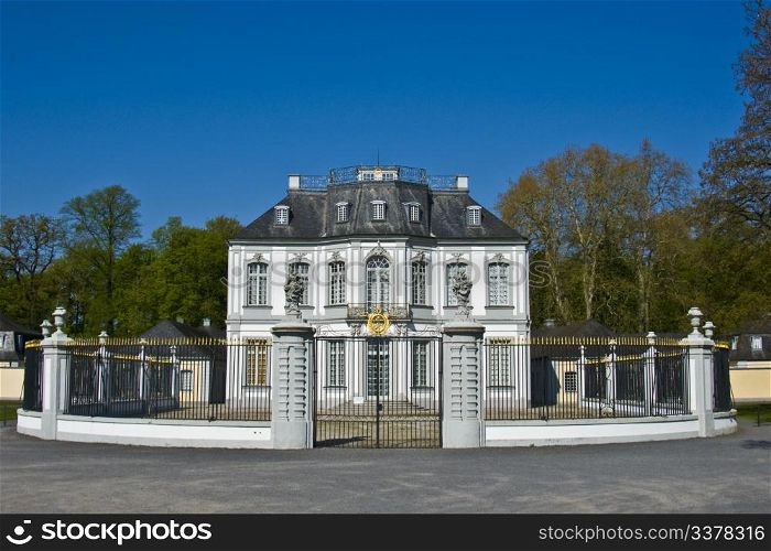 view of the hunting lodge Falkenlust of palace Augustusburg in Bruehl