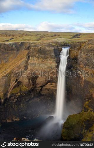 View of the landscape of the Haifoss waterfall in Iceland. Nature and adventure concept background.