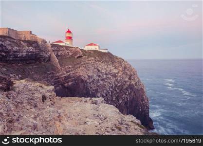 View of the lighthouse and cliffs at Cape St. Vincent at sunset. Continental Europe&rsquo;s most South-western point, Sagres, Algarve, Portugal.