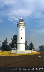 View of the Lighthouse, originally built in 1887 on Blowhole Point in Kiama, Southern Coast of NSW, Australia