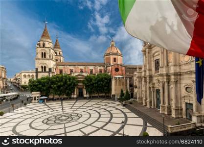view of the main piazza of acireale with Italian flag