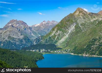 View of the Maloja pass in valley Engadine Switzerland. Beginning of the Inn River.