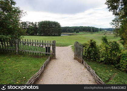 View of the meadow and forest from the manor of Mikhailovskoye village, Pushkinskiye Gory, Pskov region, Russia