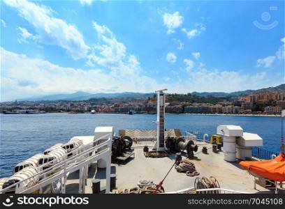 View of the Messina sea strait and coastline from the side of the ferry to Sicily island, Italy