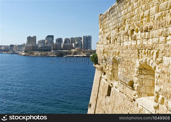 View of the modern quarter of Sliema from the Fort of Valletta. Tas-Sliema is a town located on the northeast coast of Malta in the Northern Harbour District.