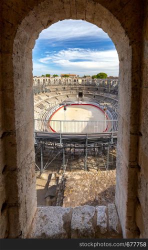 View of the old antique arena of the Roman amphitheater on a sunny day. Arles. France. Provence. France. Arles. Old antique roman amphitheater arena.