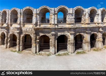 View of the old antique arena of the Roman amphitheater on a sunny day. Provence. France. Arles.. France. Arles. Old antique roman amphitheater arena.