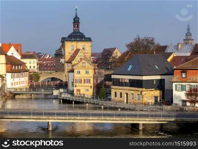 View of the old dam in the historical part of the city on a cloudy day. Bamberg. Bavaria Germany.. Bamberg. Old city dam.