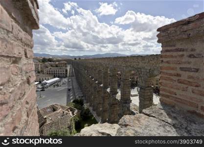 View of the old town and the roman aqueduct in Segovia, Spain