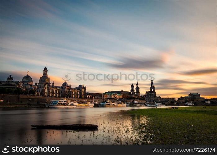 View of the oldtown of Dresden from the Neustadter Elbufer, with some of its main buildings to be recognised, including the Frauenkirche, the Cathedral or the Albertina. Long exposure.