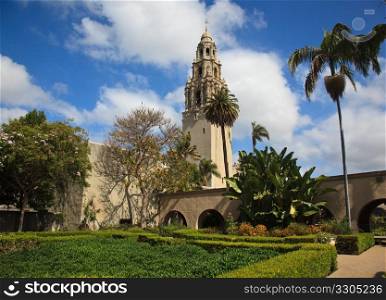 View of the ornate California Tower from the Alcazar Gardens in Balboa Park in San Diego