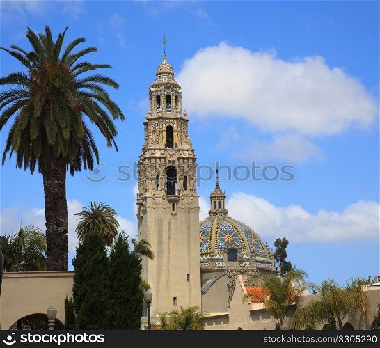 View of the ornate California Tower from the Alcazar Gardens in Balboa Park in San Diego with ornate dome