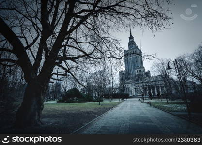 View of the palace of Culture and Science in Warsaw and nearby park on a cloudy day