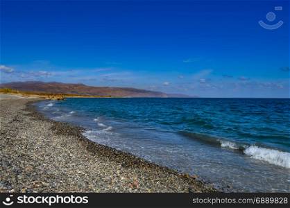 View of the pebble beach of Maleme . View of the pebble beach of Maleme in the north west of the island of Crete in Greece