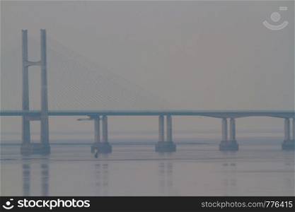 View of the Prince of Wales Bridge or second Severn Crossing forming background with copyspace, landscape.