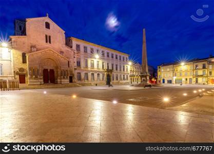View of the Republic Square and City Hall in the night lighting. Arles. Provence. France.. Arles. Republic Square and City Hall at sunset.