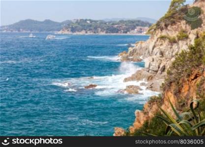 View of the rocky coast of the Costa Brava near Tossa de Mar resort.. Tossa de Mar. The coastline of Costa Brava.