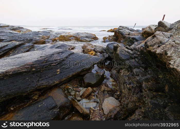 View of the rugged ocean rocky shore.. View of the rugged Atlantic rocky shore.