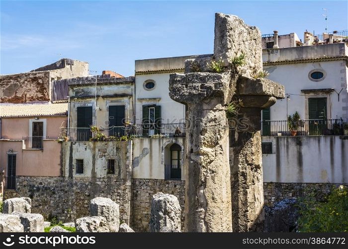 View of the ruins of the ancient greek doric temple of Apollo in Siracusa, Sicilia, Italy
