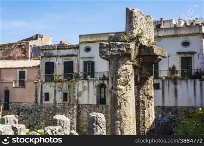 View of the ruins of the ancient greek doric temple of Apollo in Siracusa, Sicilia, Italy