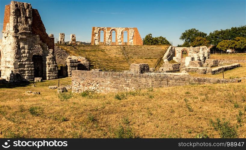 view of the ruins of the Roman theater in Gubbio - italy