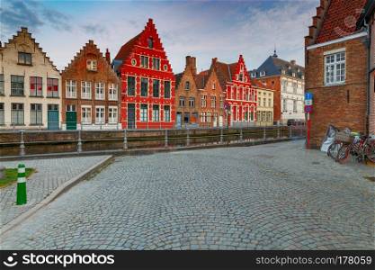 View of the Spiegel Rey canal and facades of old medieval houses at dawn. Brugge. Belgium.. Bruges. Canal Spiegel Rei.