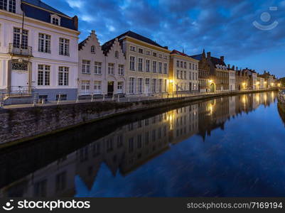 View of the Spiegel Rey canal and facades of old medieval houses at sunset. Brugge. Belgium.. Bruges. Canal Spiegel Rei.