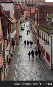 View of the stone towers and medieval buildings in the historic city. Rothenburg ob der Tauber. Bavaria Germany.. Rothenburg ob der Tauber. Old famous medieval city.