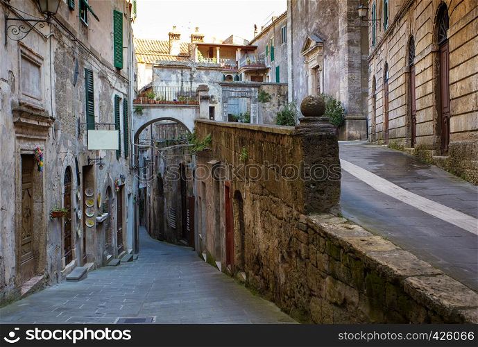 View of the streets in the old famous tuff city of Sorano, province of Siena. Tuscany, Italy