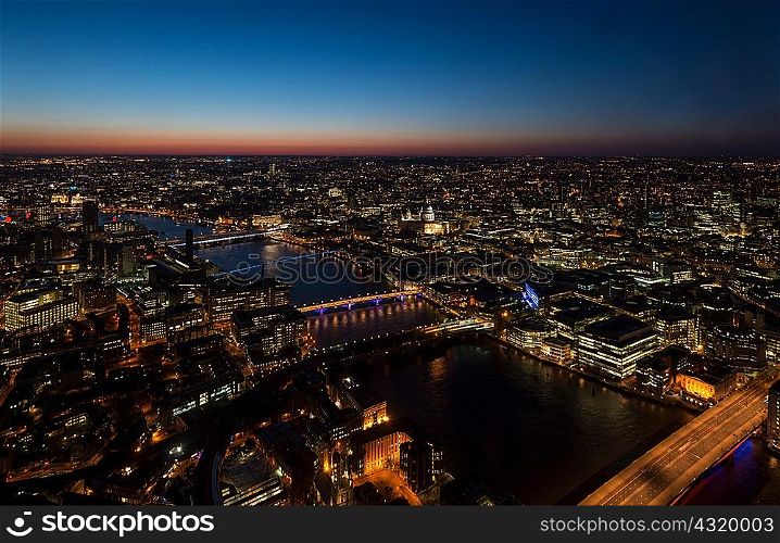 View of the Thames river and bridges at night, London, UK