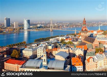 View of the town and the Daugava River from the height of the observation platform of the church of St. Peter.. View of Riga and the Daugava River from above.