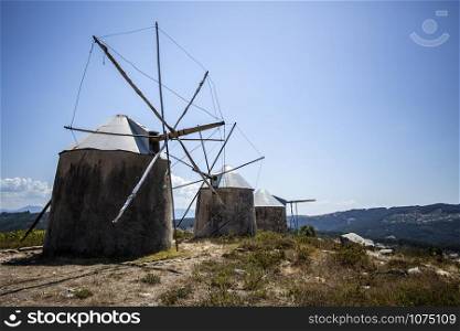 View of the traditional masonry windmills of Gavinhos near the Portuguese town on Penacova, Coimbra, Portugal