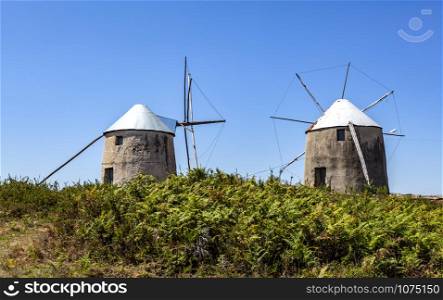 View of the traditional masonry windmills of Gavinhos near the Portuguese town on Penacova, Coimbra, Portugal