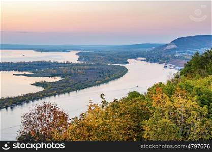View of the valley of the Volga river from the hill on the sunset
