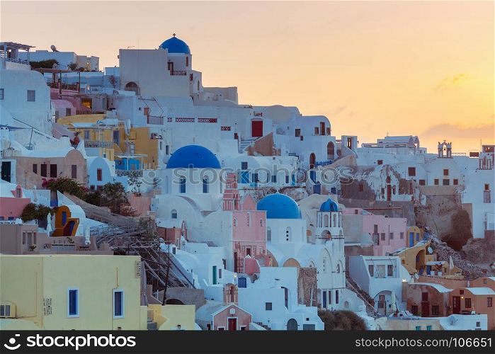 View of the village Oia on the sunset.. Beautiful view of the village Oia on the sunset. Santorini Island, Greece.