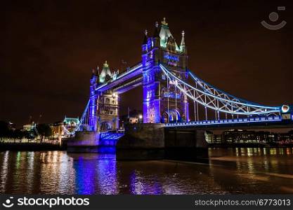 view of Tower Bridge over the River Thames at night, London, UK, England