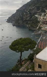 View of town at coast, Positano, Amalfi Coast, Salerno, Campania, Italy