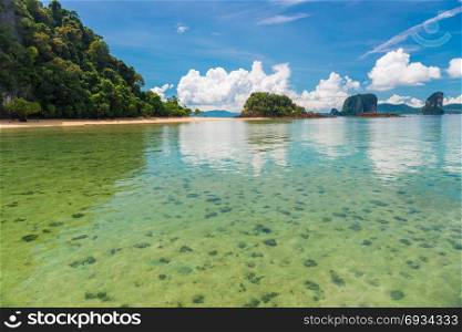View of uninhabited islands from shallow waters, Andaman Sea, Krabi Resort in Thailand