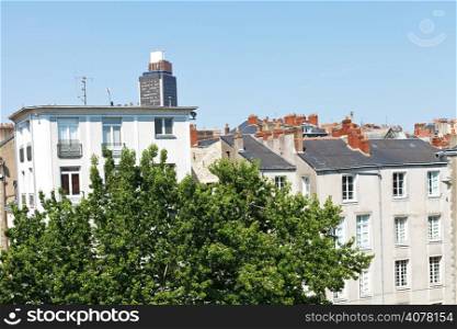 view of urban houses and Tour Bretagne (Brittany Tower) in Nantes, France