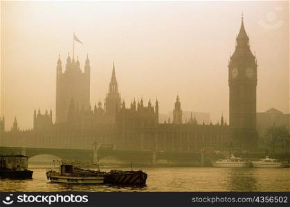 View of Westminster and Big Ben amidst fog, London, England