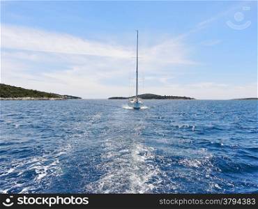view of white yacht in blue Adriatic sea, Dalmatia, Croatia