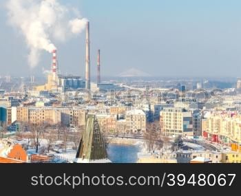 View of Wroclaw with a thermal power plant in winter.. Wroclaw. Thermal power plant.