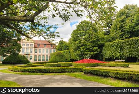 view on abbots palace landmark in gdansk danzig polish city oliva park. historical building in garden.
