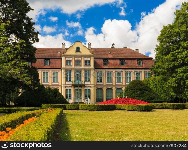 view on abbots palace landmark in gdansk danzig polish city oliva park. historical building in garden.