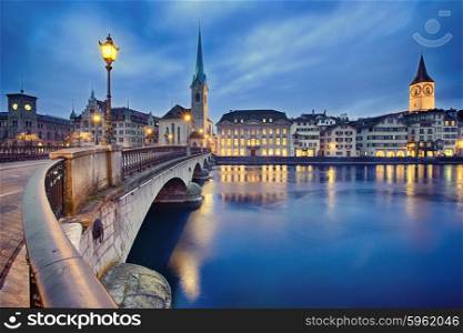 view on Fraumunster Church and Church of St. Peter at night, Zurich, Switzerland