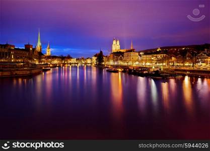 view on Fraumunster Church, Church of St. Peter and Grossmunster at night, Zurich, Switzerland