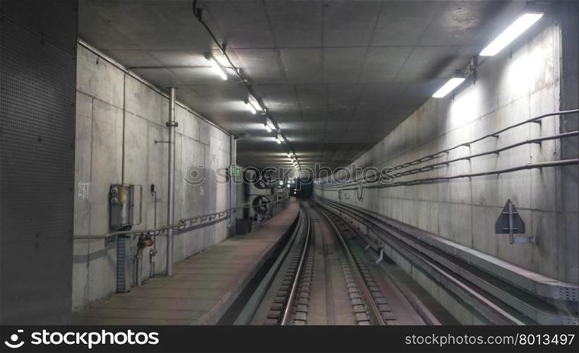 View on interior of metropolitan tunnel with artificial light. Interior of metropolitan